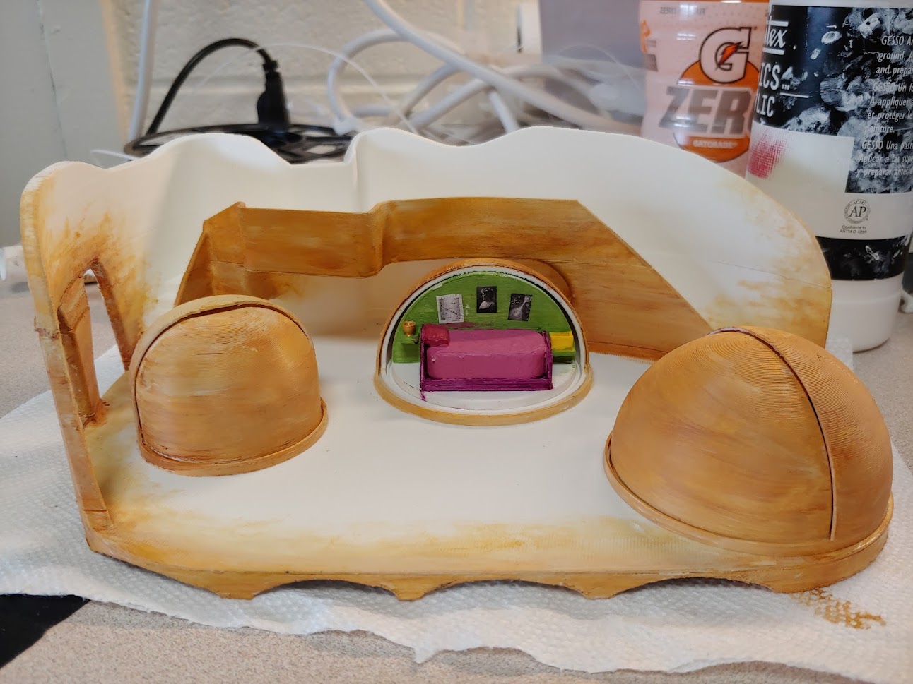 Photo of the painted 3D model of the set design.