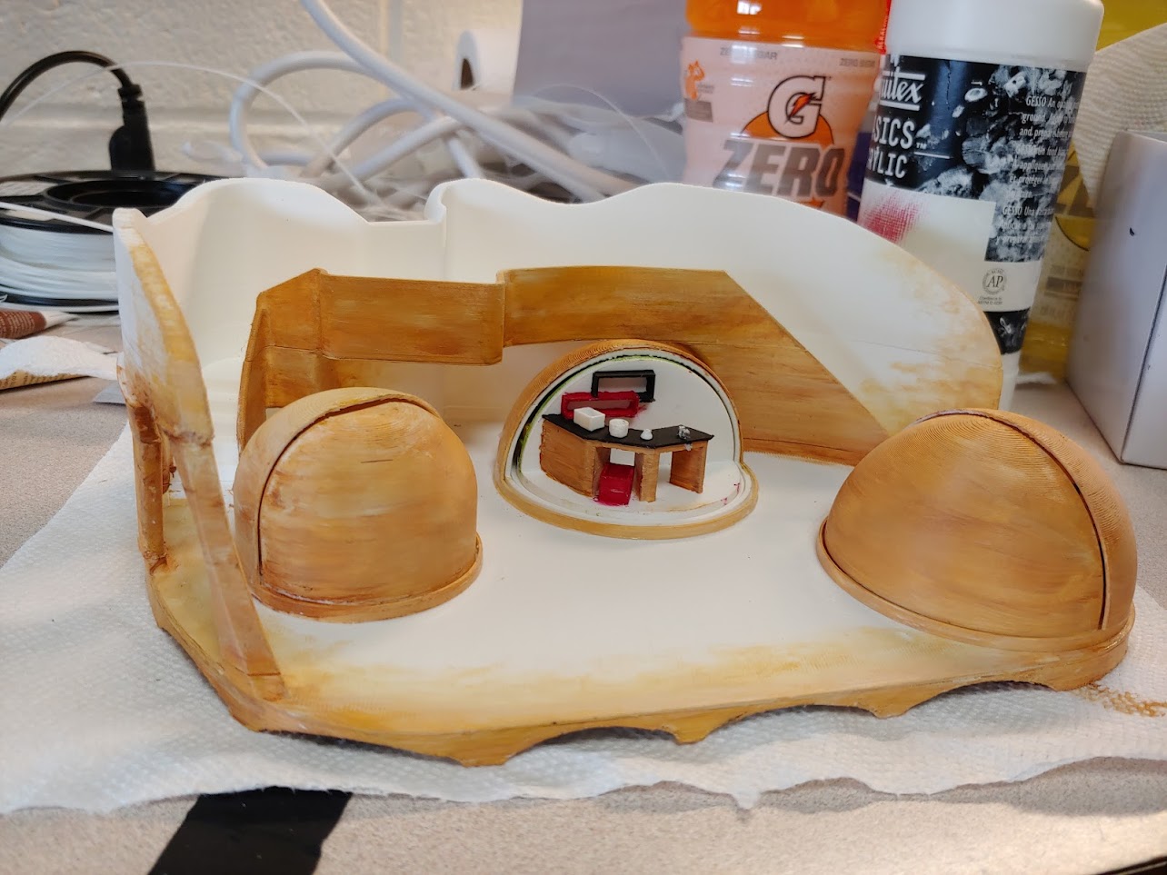 Photo of the painted 3D model of the set design.