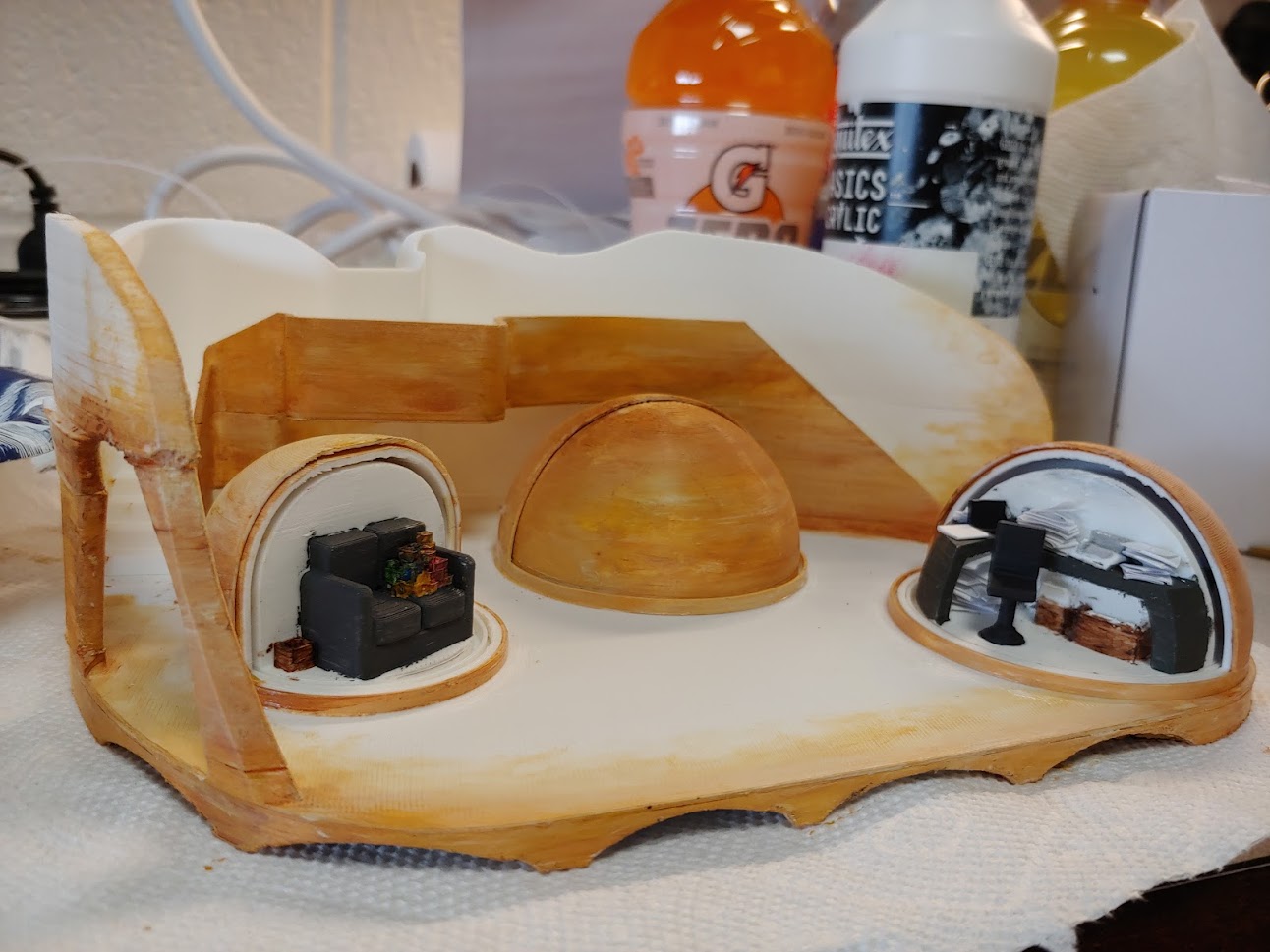 Photo of the painted 3D model of the set design.