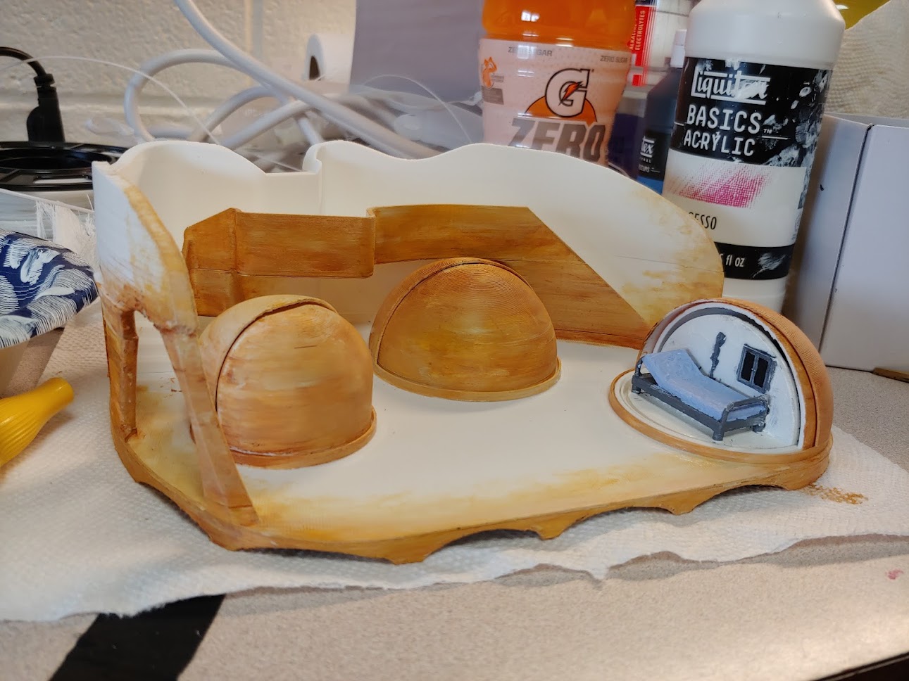 Photo of the painted 3D model of the set design.